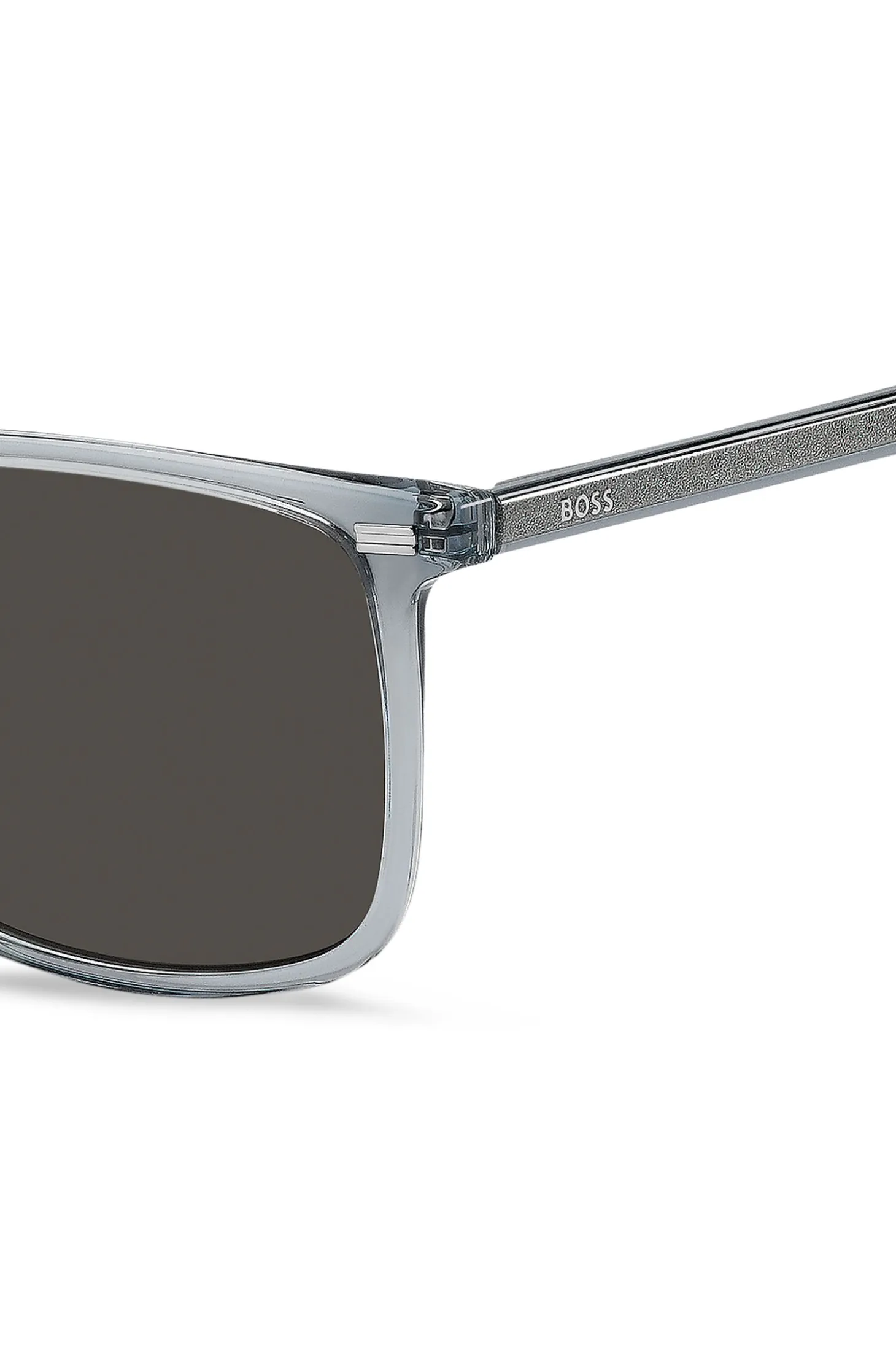 Transparent-blue sunglasses with temple logo