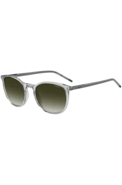 Transparent-grey sunglasses with green logo