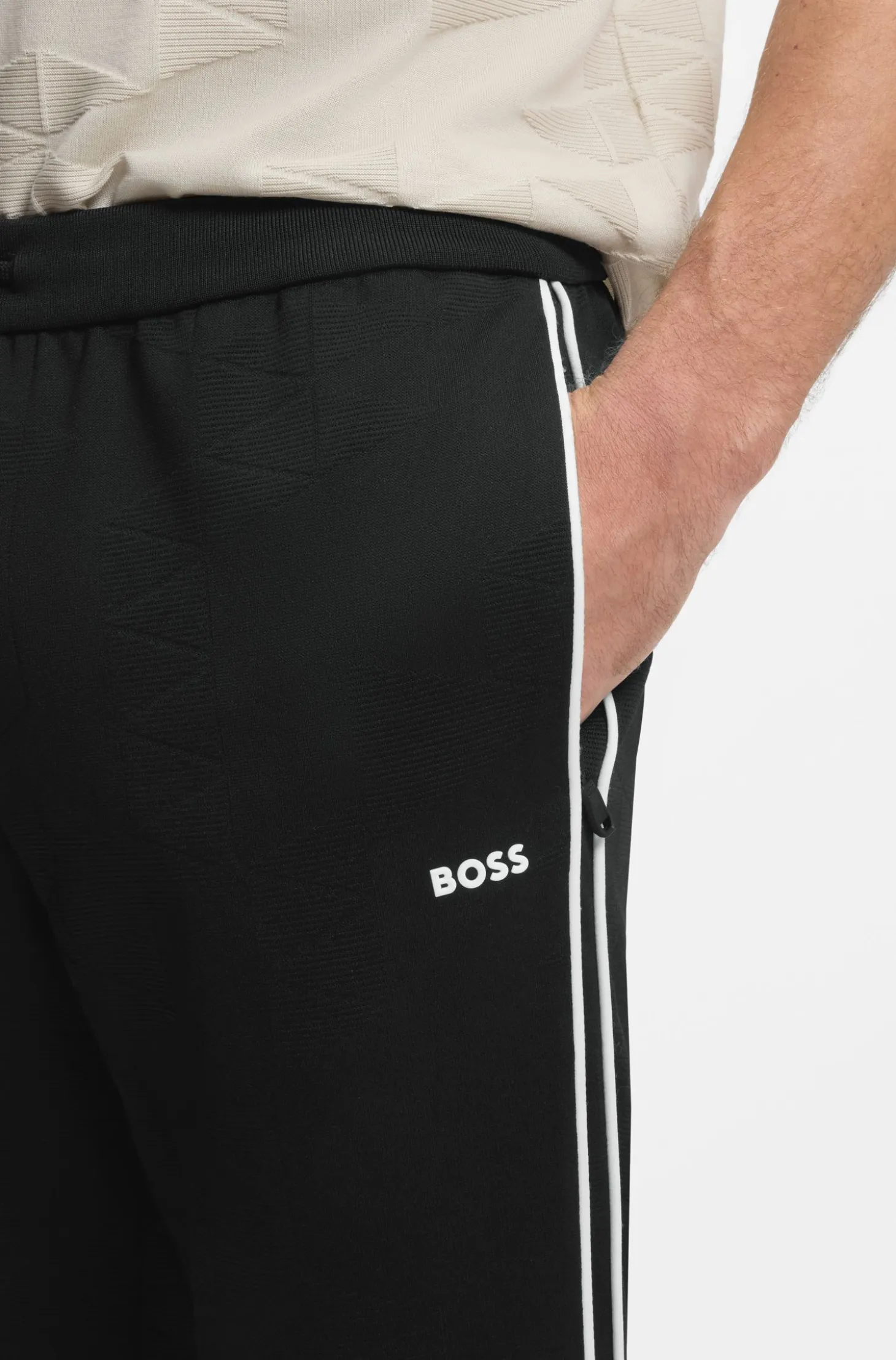 Triangle-jacquard tracksuit bottoms with rubberised logo