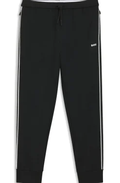 Triangle-jacquard tracksuit bottoms with rubberised logo