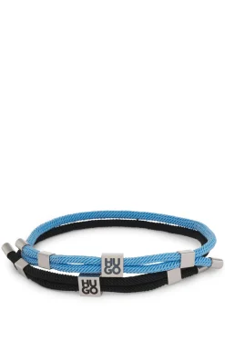 Two-pack of cord cuffs with logo plaques