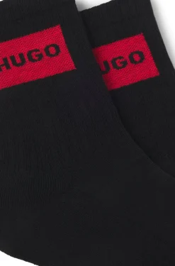 Two-pack of short-length socks with red logos