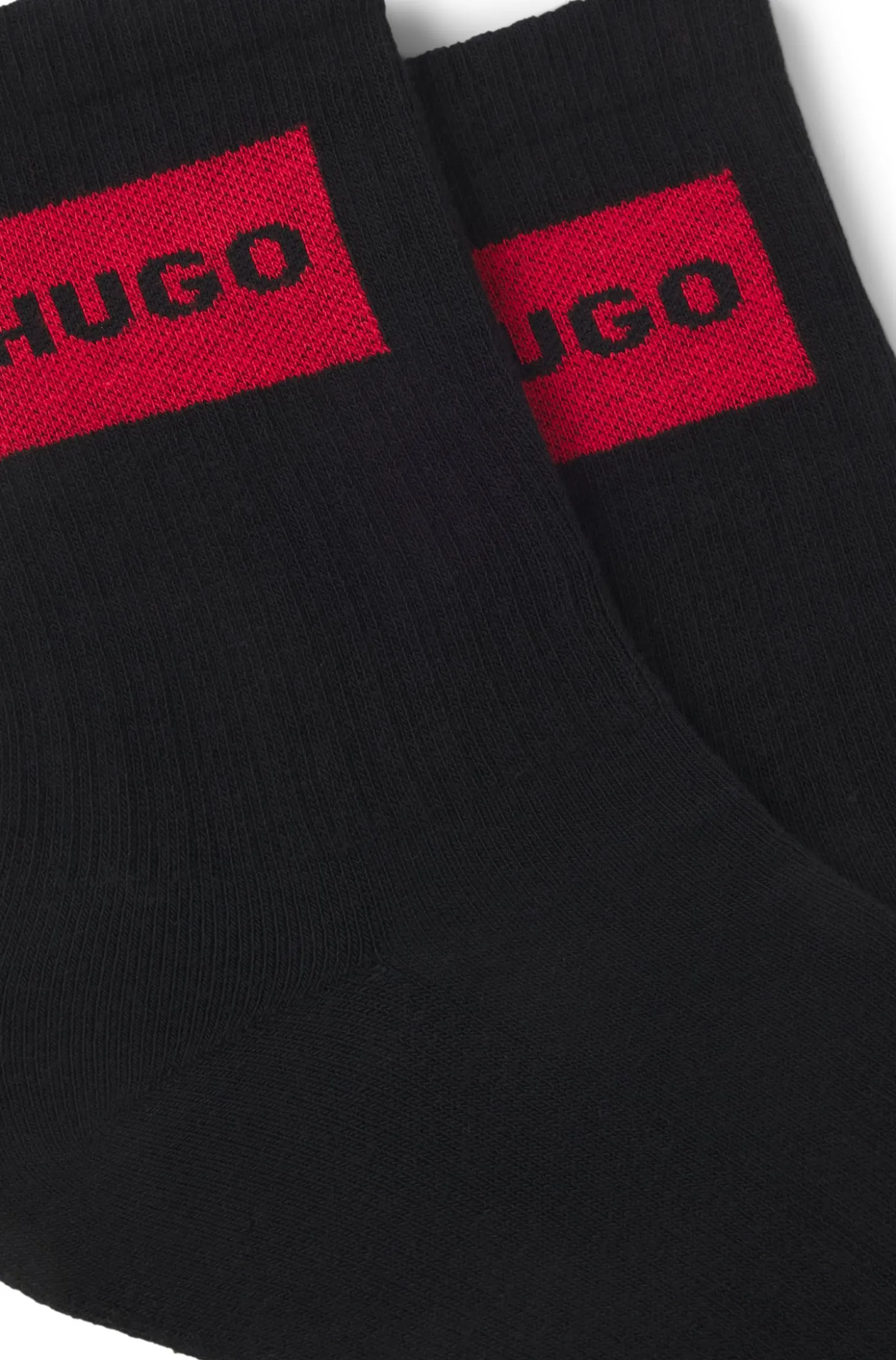 Two-pack of short-length socks with red logos
