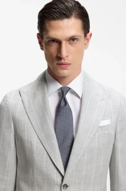 Two-piece slim-fit suit in cotton and virgin wool