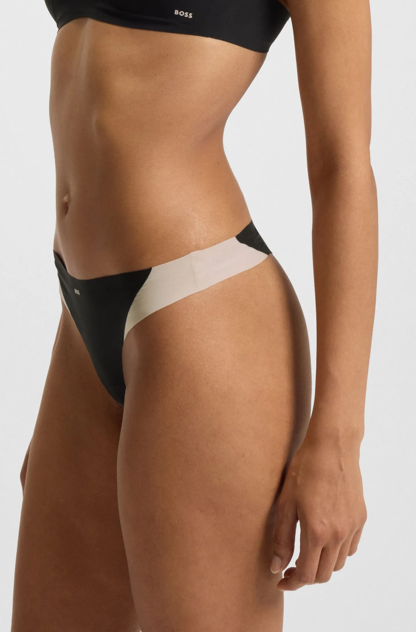 Two-tone thong in stretch jersey