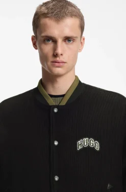 Varsity jacket in cotton corduroy with logo patch