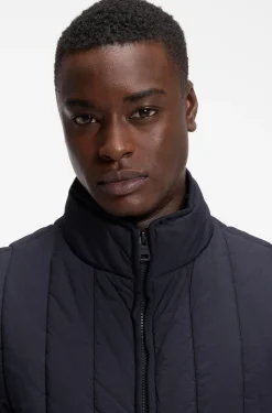 Vertical-quilted gilet with logo detail