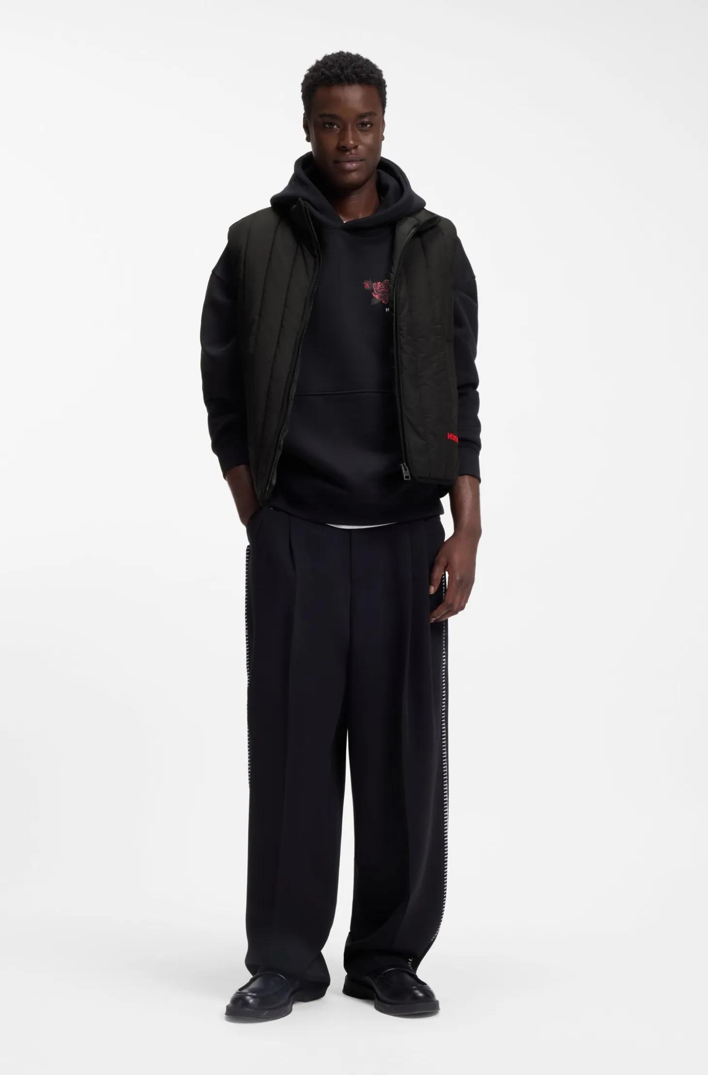 Vertical-quilted gilet with logo detail
