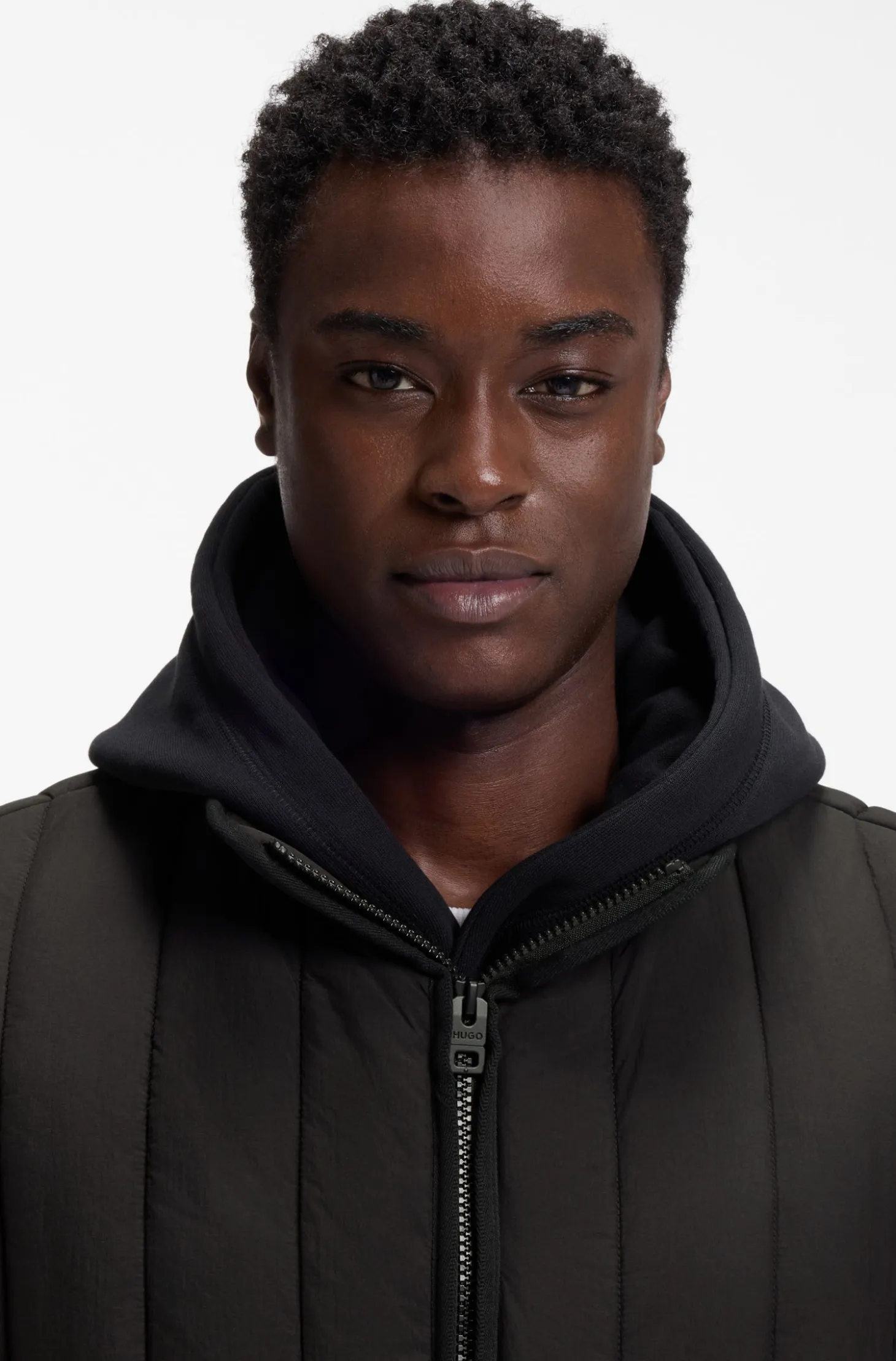 Vertical-quilted gilet with logo detail