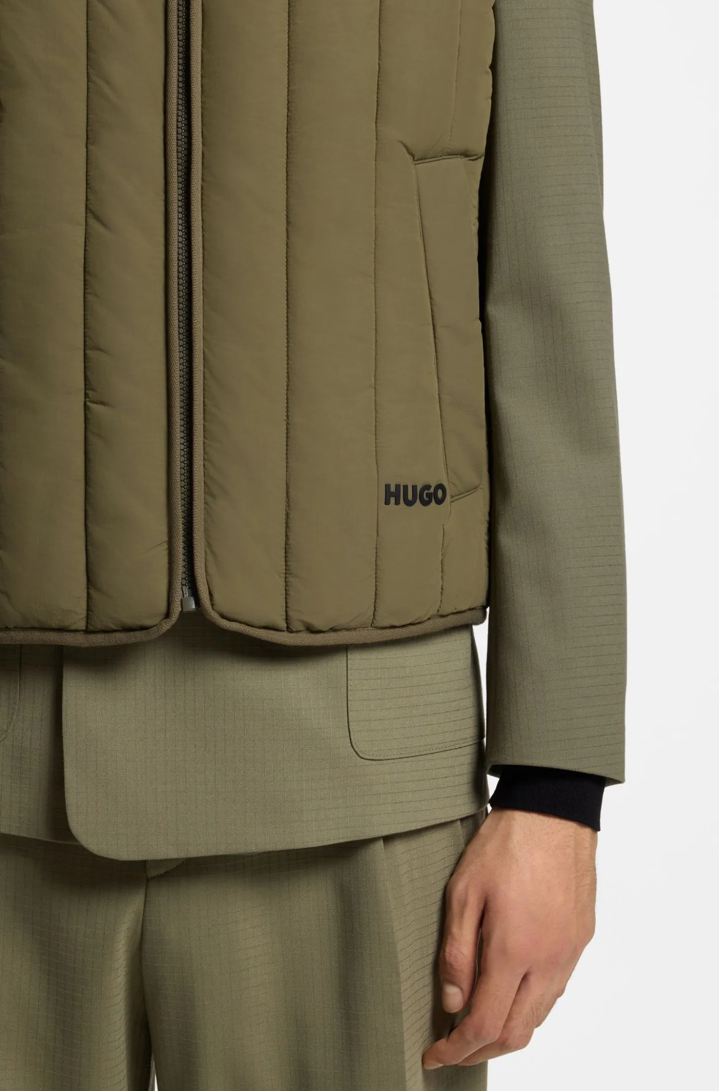 Vertical-quilted gilet with logo detail