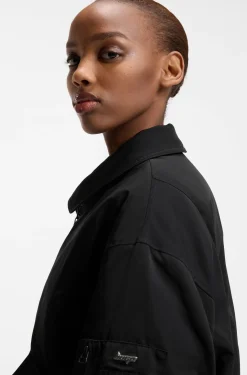 Water-repellent bomber jacket with zipped sleeve pocket