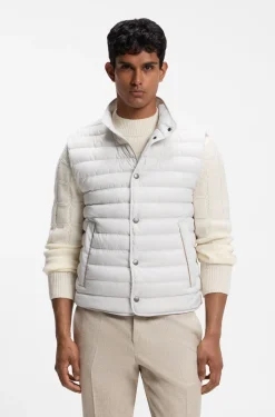 Water-repellent gilet with certified down filling