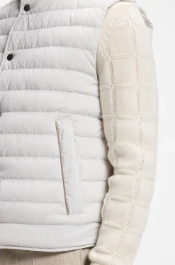 Water-repellent gilet with certified down filling