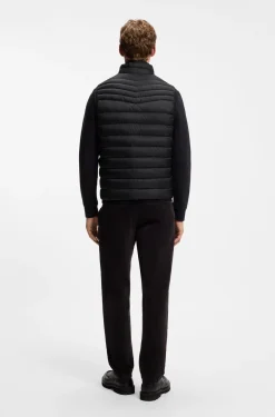 Water-repellent gilet with logo patch