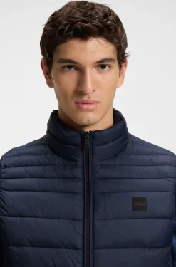 Water-repellent gilet with logo patch