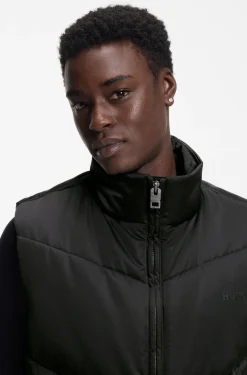 Water-repellent gilet with tonal logo