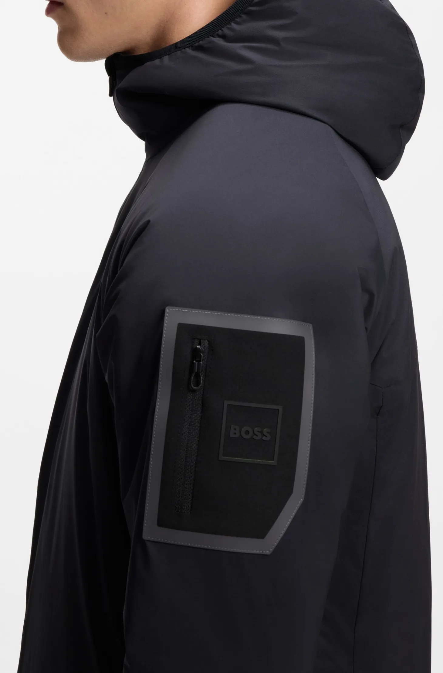 Water-repellent jacket with adjustable hem