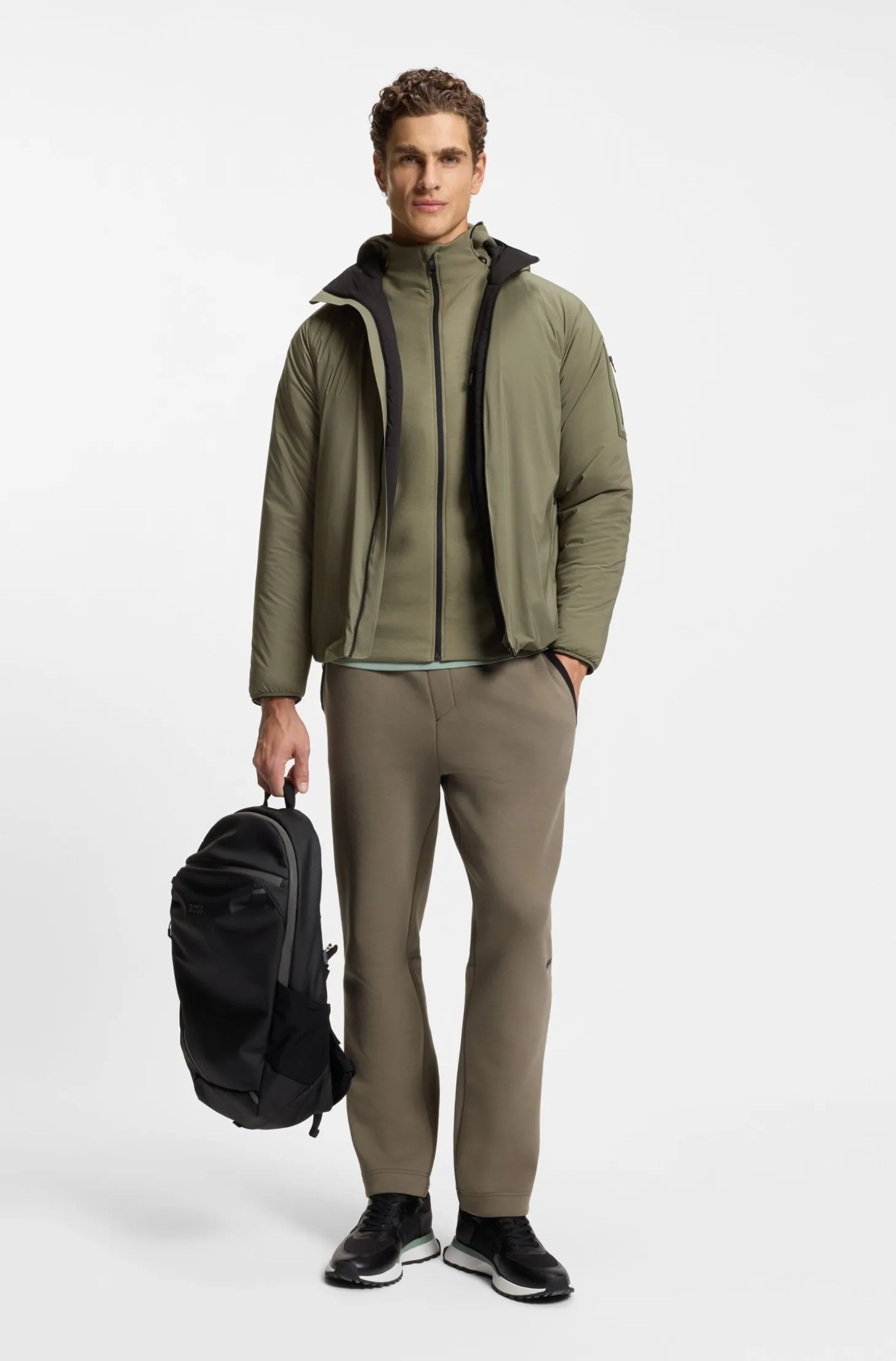 Water-repellent jacket with adjustable hem