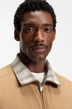 Water-repellent jacket with checked collar