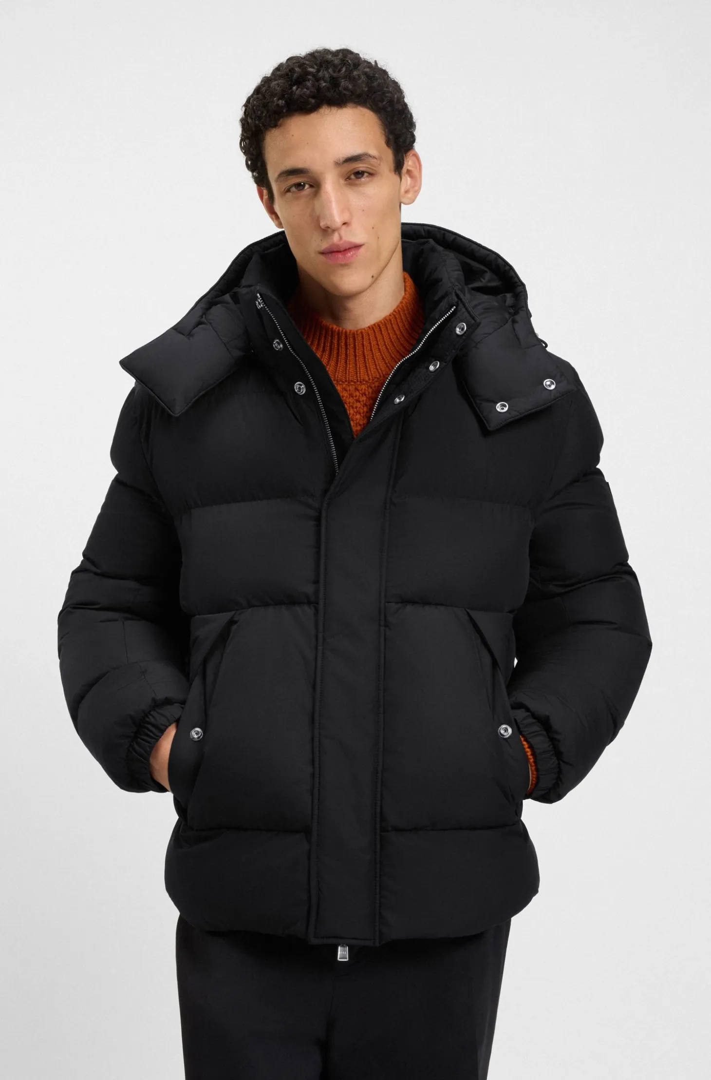 Water-repellent jacket with logo badge