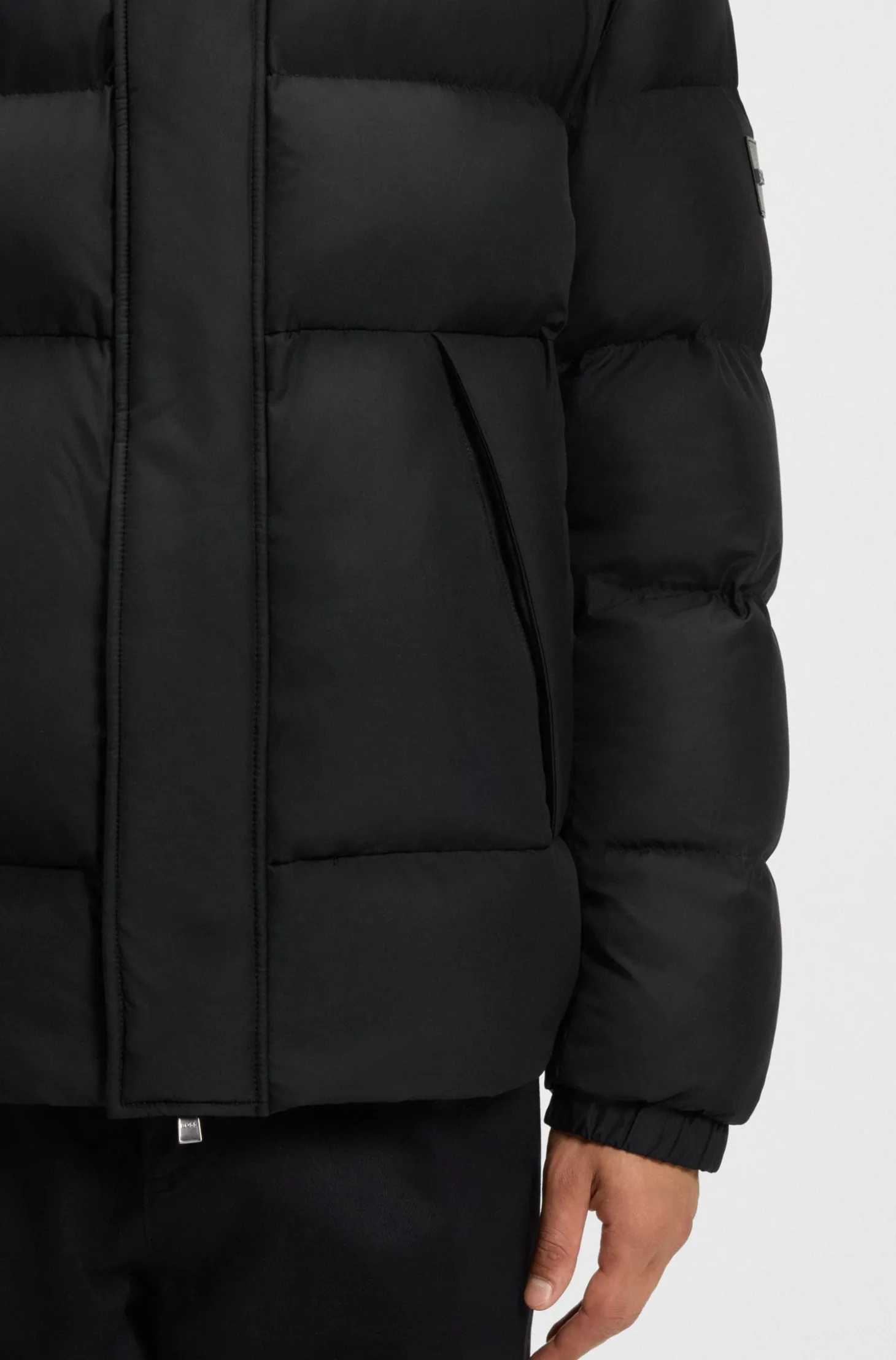 Water-repellent jacket with logo badge