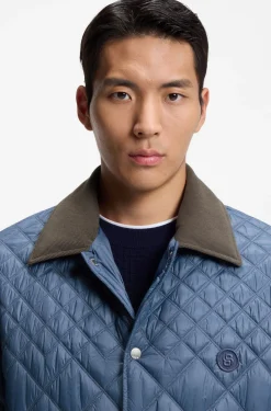 Water-repellent jacket with mixed quilting