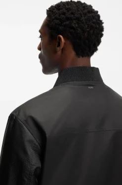 Water-repellent jacket with monogram-pattern sleeves