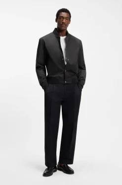 Water-repellent jacket with monogram-pattern sleeves