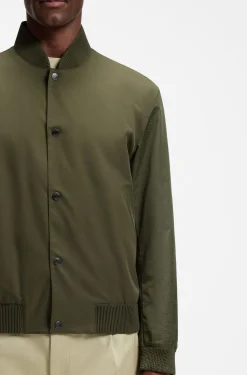 Water-repellent jacket with monogram-pattern sleeves