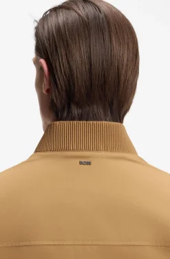 Water-repellent jacket with monogram-pattern sleeves