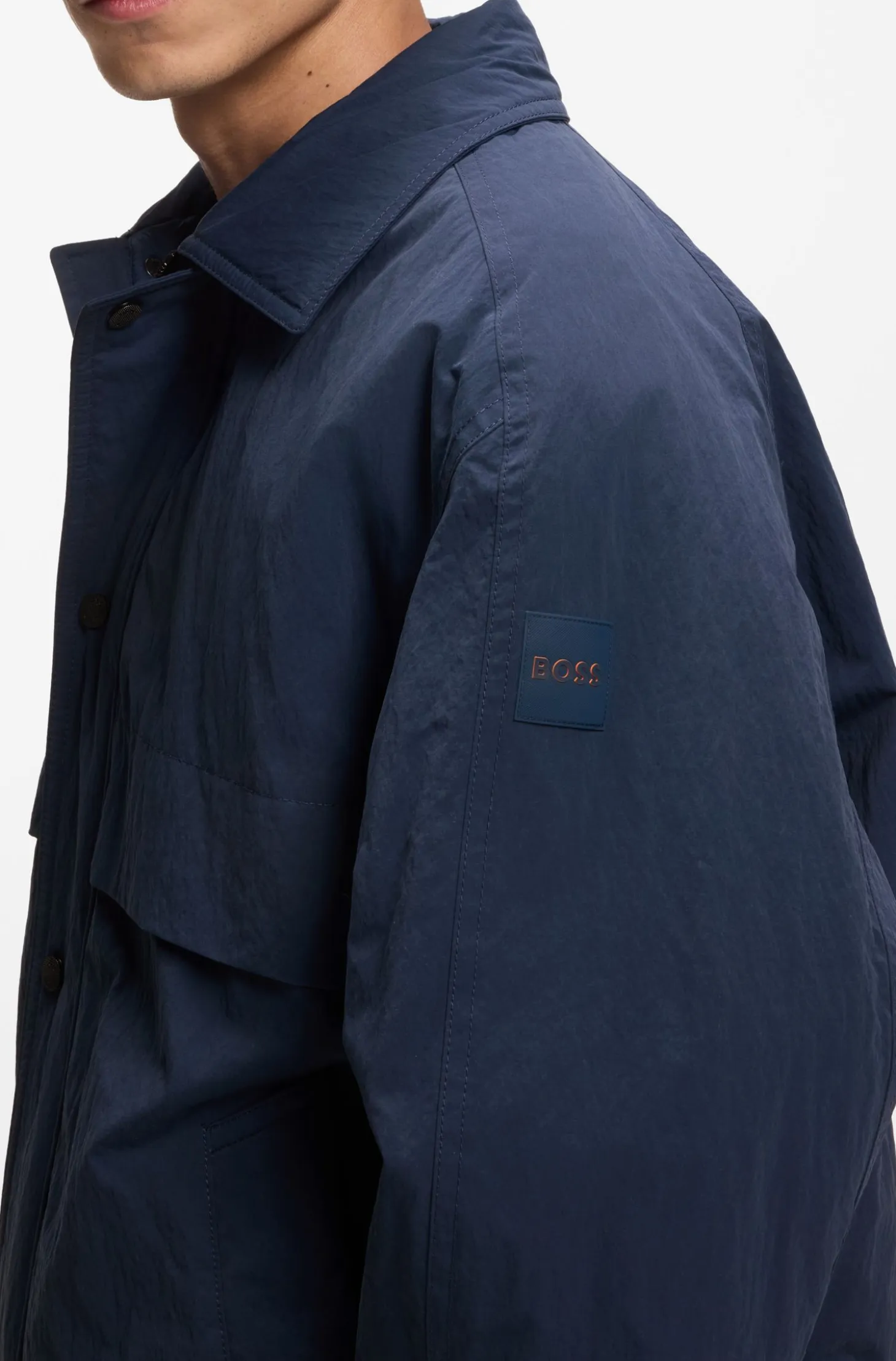 Water-repellent jacket with removable hood