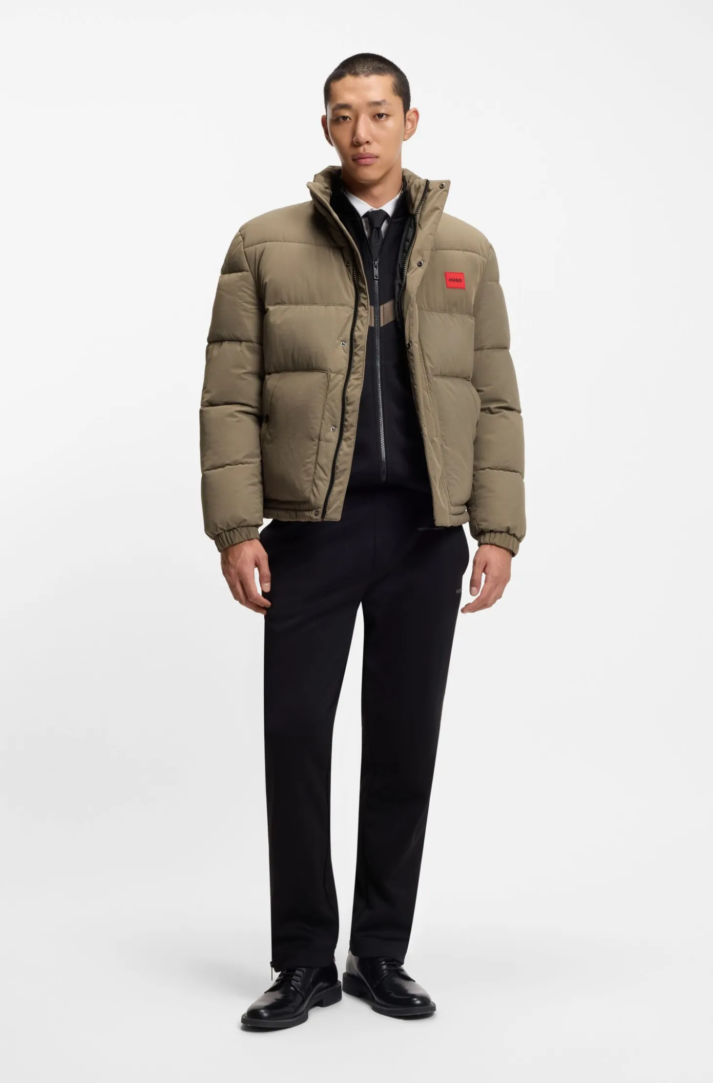 Water-repellent padded jacket with logo patch