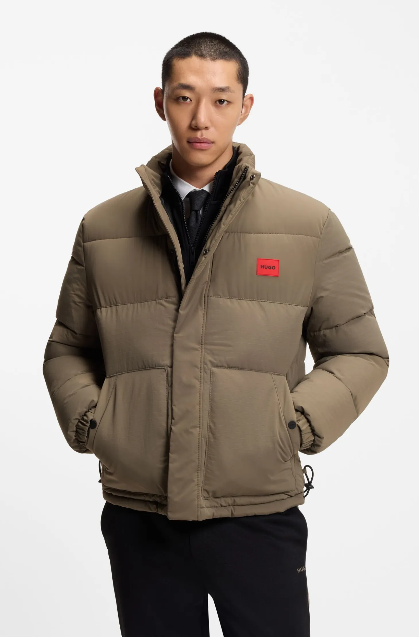 Water-repellent padded jacket with logo patch