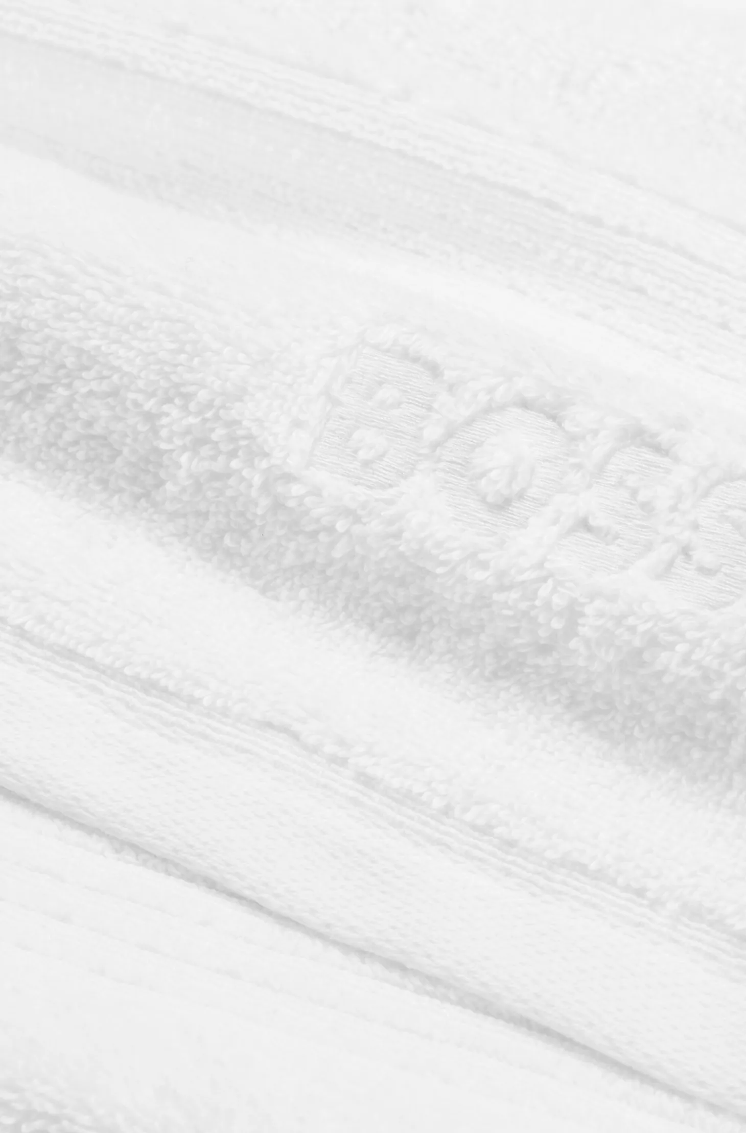 White cotton bath towel with embroidered logo