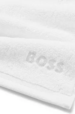 White cotton face cloth with embroidered logo