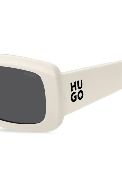 White sunglasses with stacked-logo temples