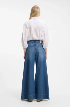 Wide-leg high-rise jeans in vintage-wash denim