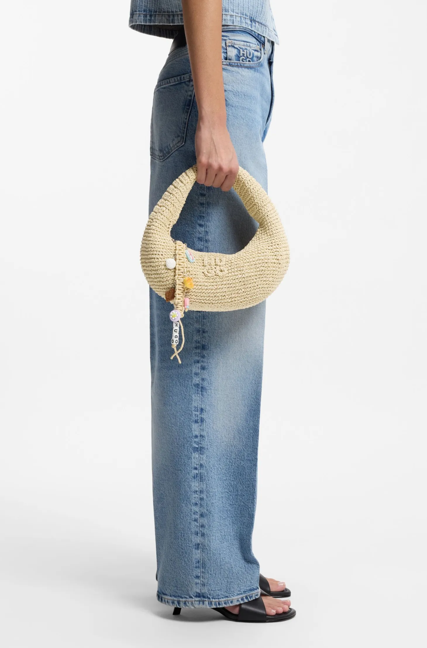 Woven hobo bag with logo charm