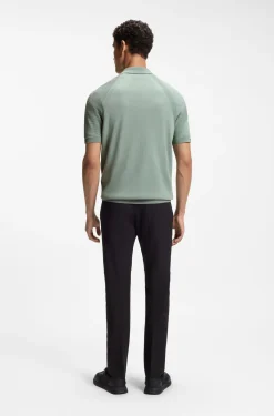 Zip-neck knit polo with body-mapping design