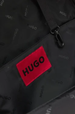Zipped backpack with rubber logo patch